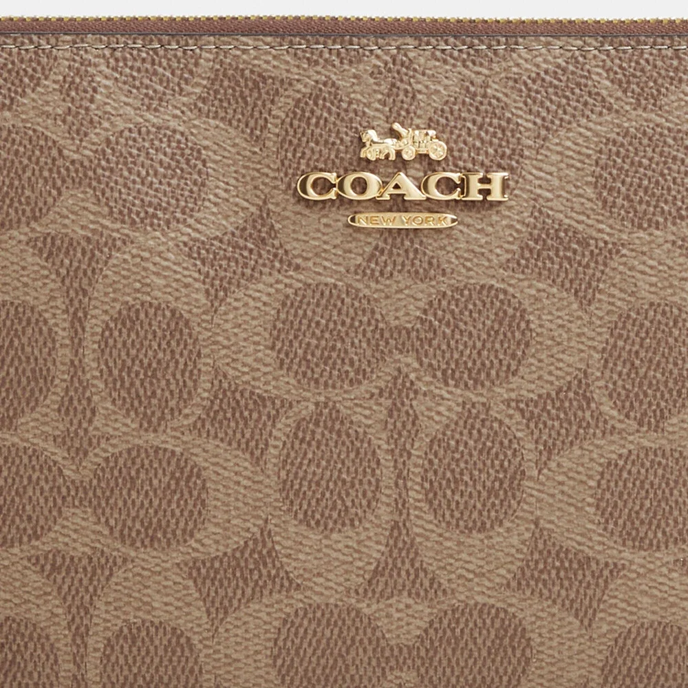 Coach Outlet Large Corner Zip Wristlet In Signature Canvas